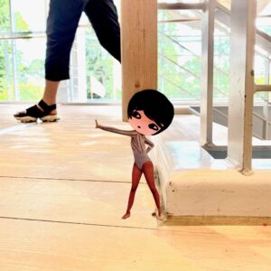 Tiny PhoebeNewYork at top of the stairs